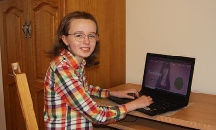 Fíona Geary at her computer at home