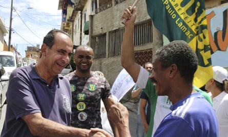 Alexandre Kalil, a former football club president, greets people on the campaign trail in Belo Horizonte.