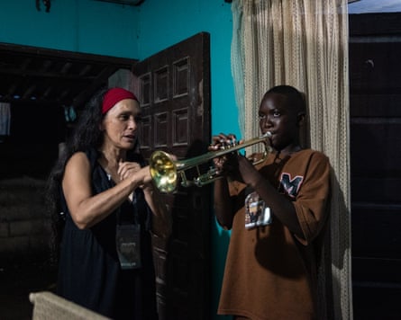 Ronny Farley (13 years old), member of the group “Son Caliente,” practices for his performance at the Drum Festival