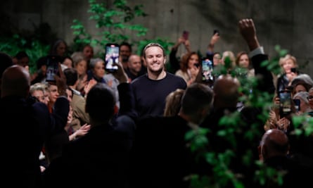 Guests applaud the creative director of Gucci, Sabato De Sarno.