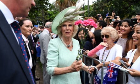 Camilla, Duchess of Cornwall, receives flowers during the visit to Brisbane