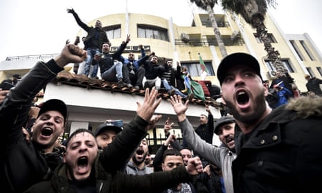Protesters chant slogans during a rally in the city of Tizi Ouzou