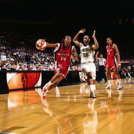 WNBA players on the court.