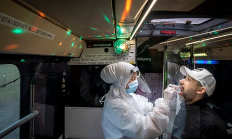 People are being PCR tested in Partybus in Ishoej, Denmark. While the citizens are being tested, they can listen to music and watch disco lights.