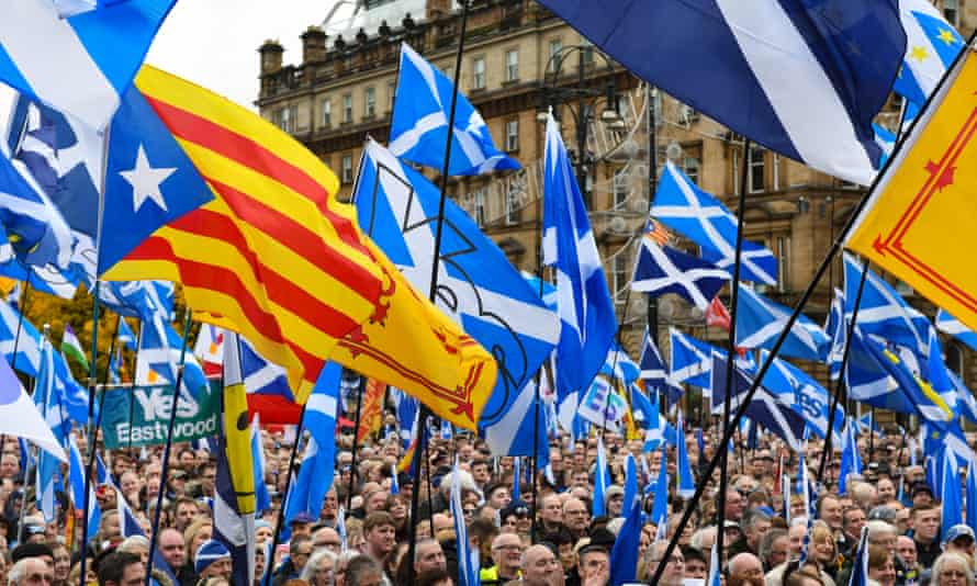 Yes flags being waved during a rally
