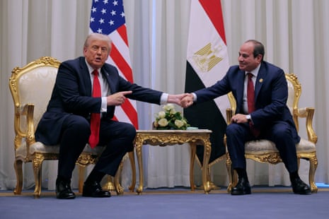 Donald Trump and Abdel Fattah al-Sisi shake hands while speaking to the press during the summit at the Sharm El Sheikh International Congress Centre.