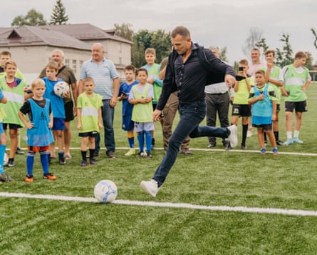 Andriy Shevchenko playing football with children in Borodianka