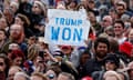 A Trump supporter holds a 'Trump Won' sign at a rally by the ex-president at the Canyon Moon Ranch festival grounds on 15 January 2022 in Florence, Arizona.