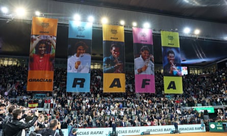 Gracias Rafa: a banner marking Nadal’s five career titles in Madrid is unveiled after the match.