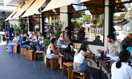 People eat at a restaurant in downtown Beirut on 2 August.