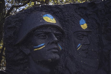 A monument dedicated to the memory of Soviet Union soldiers in the Great Patriotic War is newly painted in the colours of the Ukrainian flag in Izium.