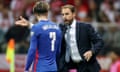 The England manager, Gareth Southgate, gives instructions to Jack Grealish against Poland
