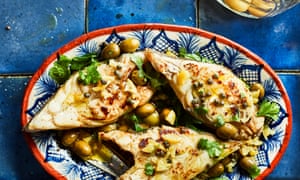 Fish with preserved lemon, green olives and capers.