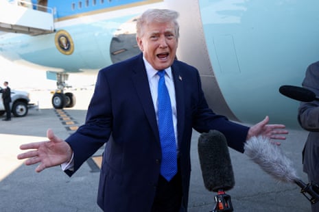 US President Donald Trump speaks to the media before departing West Palm Beach aboard Air Force One, Florida.