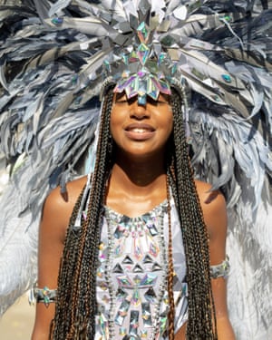 A masquerade dancer enjoying the sun