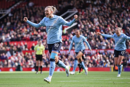 Vivianne Miedema celebrates after scoring for Manchester City against Manchester United