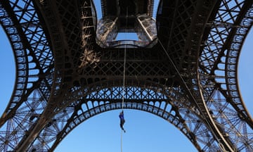 Anouk Garnier ascends the Eiffel Tower during a successful attempt to beat the world rope climbing record