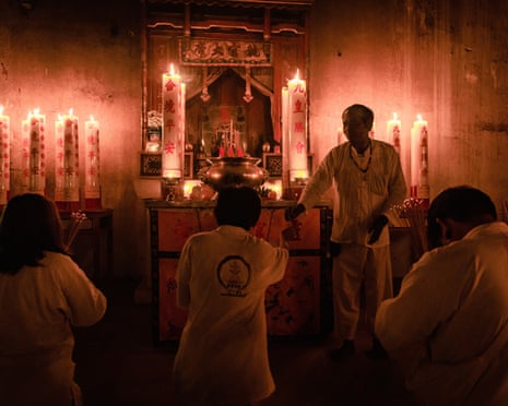 Worshippers pray at the Kieo Ong La Chinese shrine in Trang