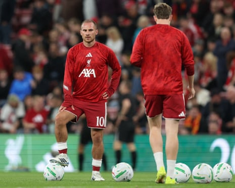 Liverpool's Alexis Mac Allister looks thoughtful during the warm up.