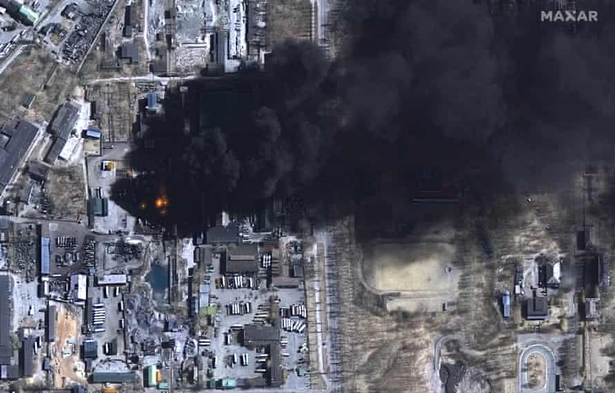 A satellite image shows a close up of burning oil storage tanks in Chernihiv, Ukraine, 21 March