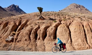 Cyclist en route to Telouet, Ounila Valley, Morocco