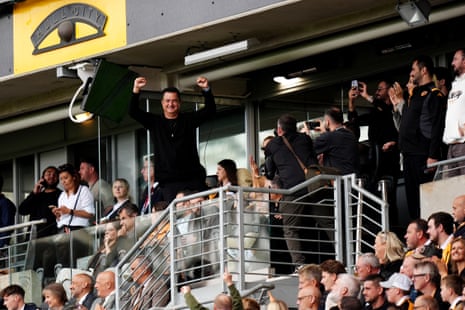 Hull City owner Acun Ilicali celebrates in the stands.
