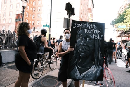 A protester at the Black Women Matter Say Her Name march on 3 July 2020 in Richmond, Virginia. The banner depicts Dominique ‘Rem’mie’ Fells, a Black trans woman who was killed in June 2020.