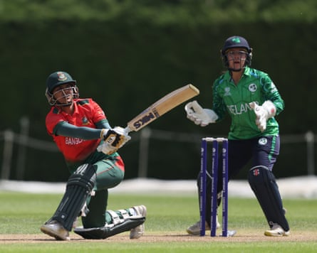 Bangladesh batter Juairiya Ferdous falls to one knee to slog-sweep a boundary in her team’s Women’s T20 World Cup warm-up game against Ireland in Loughborough.