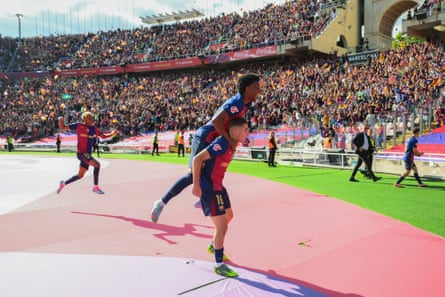 Fermin Lopez of Barcelona celebrates with Alejandro Balde during the win over Real Madrid.