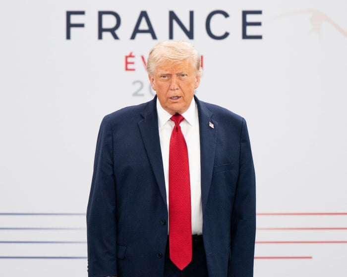 Donald Trump jokes 'I'm the boss' before meeting on final day of G7 summit – video