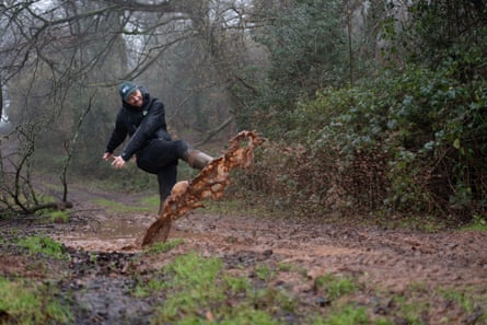Jon Barrett playing in the mud