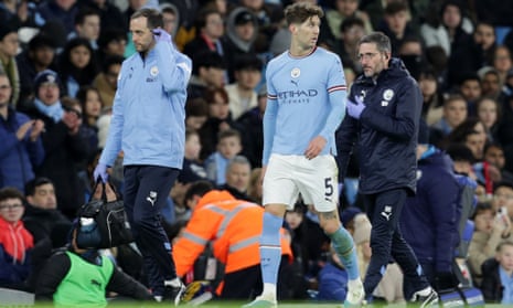 Manchester City’s John Stones walks along the touchline