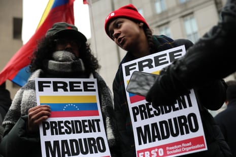 People in support of President of Venezuela Nicolas Maduro hold signs outside of Daniel Patrick Moynihan United States Courthouse before Maduro’s and first lady Cilia Flores arraignment on January 05, 2026 in New York City.