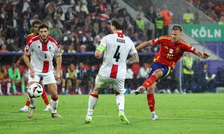 Dani Olmo scores Spain’s fourth goal in their victory against Georgia in the last 16.