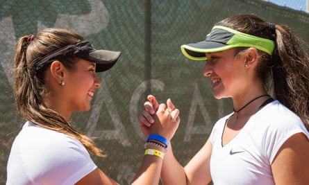 Two girls handshake t Rafa Nadal Tennis Centre at Sani Resort, Greece
