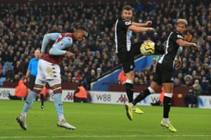 An unmarked Ezri Konsa heads goalwards but Dubravka saves.