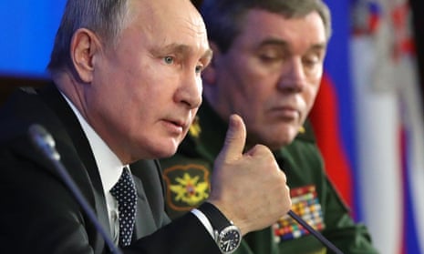 Vladimir Putin at an annual military meeting