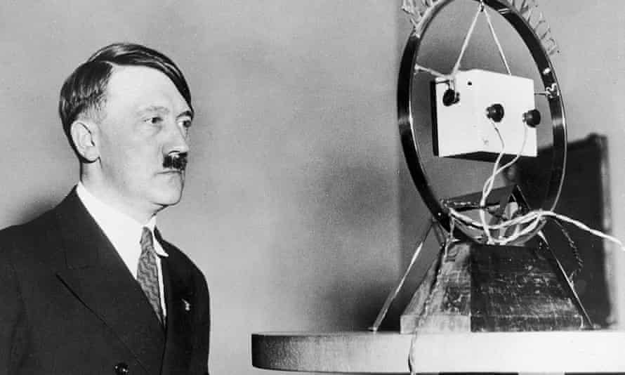 Nazi leader Adolf Hitler makes his first radio broadcast as German Chancellor in front of a radio microphone.