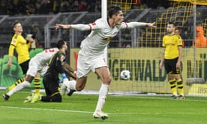 Patrik Schick wheels away after completing RB Leipzig’s comeback at Borussia Dortmund.