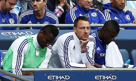 John Terry watches from the sidelines during the second half at the Etihad.