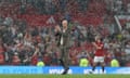 Erik ten Hag salutes an appreciative home crowd after Manchester United’s defeat by Arsenal.