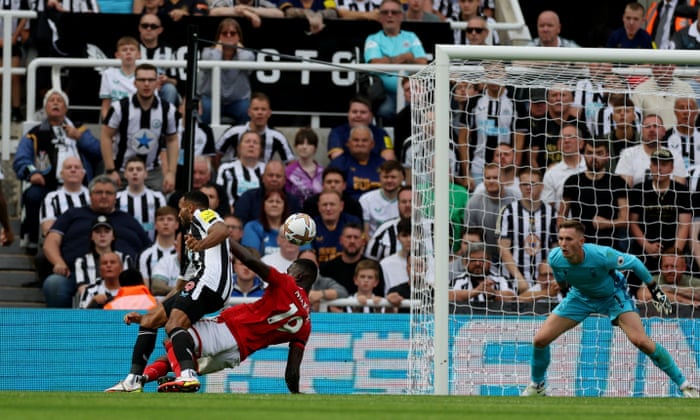 Newcastle United’s Callum Wilson scores their second goal past Nottingham Forest’s keeper Dean Henderson.