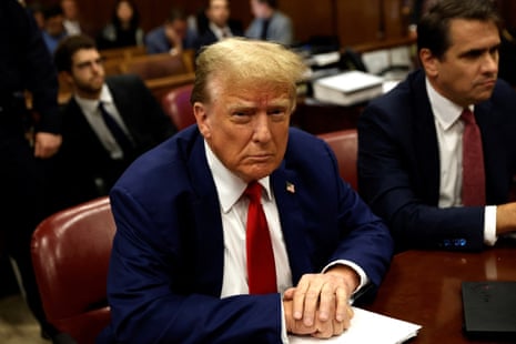 Donald Trump awaits the start of his criminal trial at the New York state supreme court on Monday.