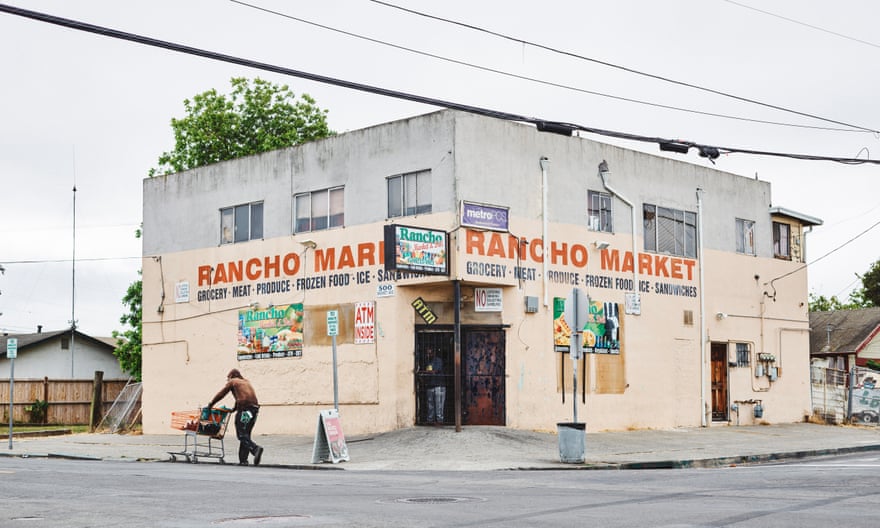 The Rancho Market store in north Richmond. A mural of gunshot victims used to blanket its wall until its owner recently decided to patch up the bullet holes and repaint the walls.