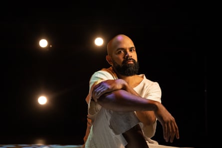 Luke Currie-Richardson sitting on stage