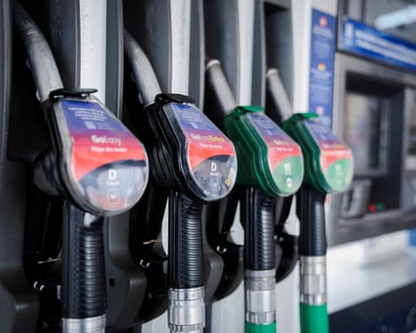 Fuel pump nozzles at an unrelated petrol station in Copenhagen, Denmark.