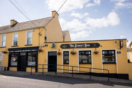 The yellow-painted pub open again, looking freshened up and with its new signs.