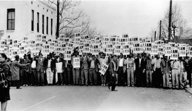 Sanitation Workers assemble in front of Clayborn Temple, Memphis, for a solidarity march, carrying “I Am A Man” banners