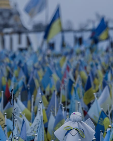 Ukrainian flags, photos and other memorabilia on the Independence Square commemorate fallen soldiers fighting for Ukraine.