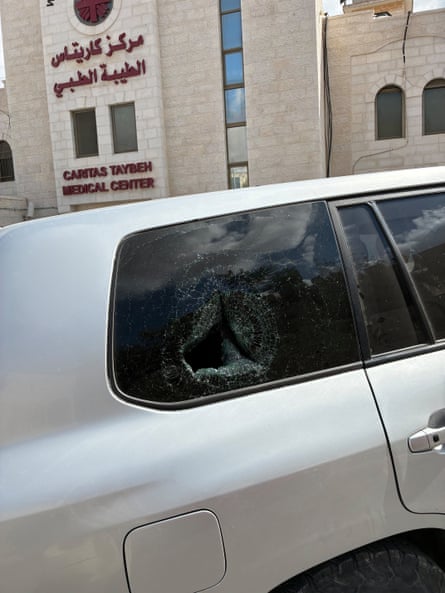 A smashed rear passenger window